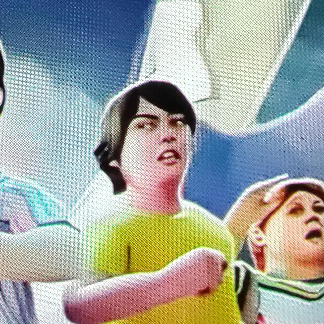 J.