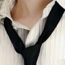 金本芳典